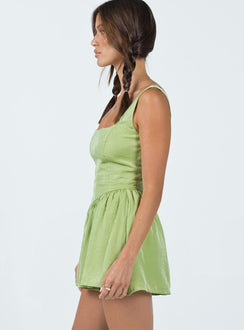 Romper Silky material  Fixed shoulder straps  Gathered waist  Twin hip pockets  Invisible zip fastening at back 