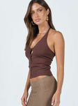 Top Spare button included  Soft knit material  Halter neck tie fastening  V neckline  Button front fastening 