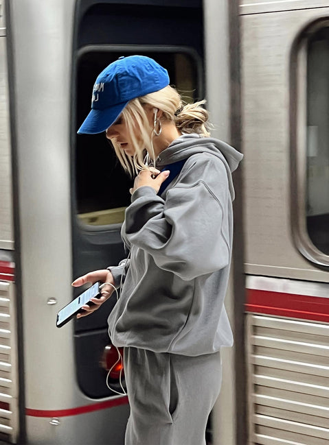 back view of model wearing Princess Polly Ritu Oversized Hooded Charcoal Cropped 