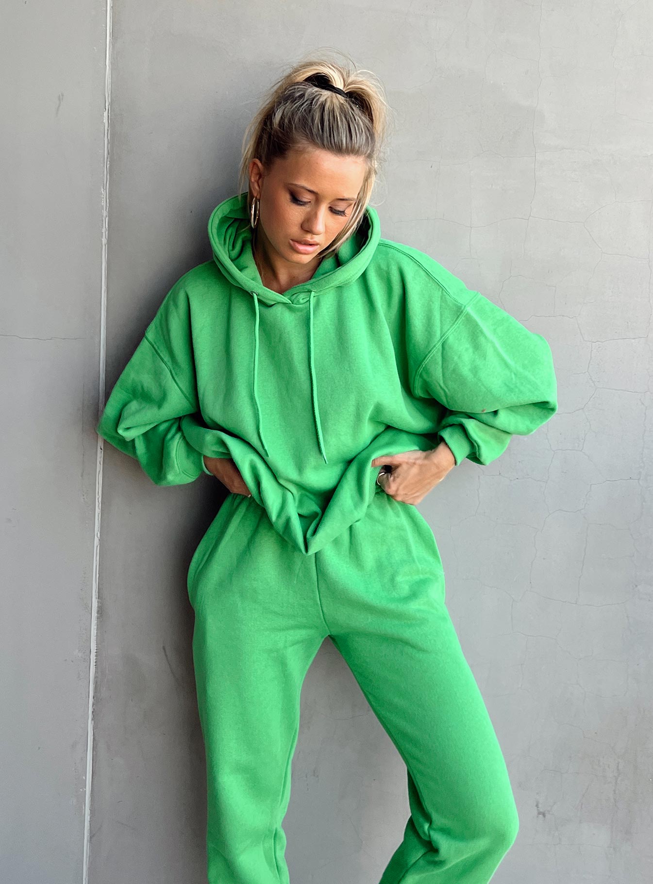 front view of model wearing Princess Polly Ritu Oversized Hoodie Green 