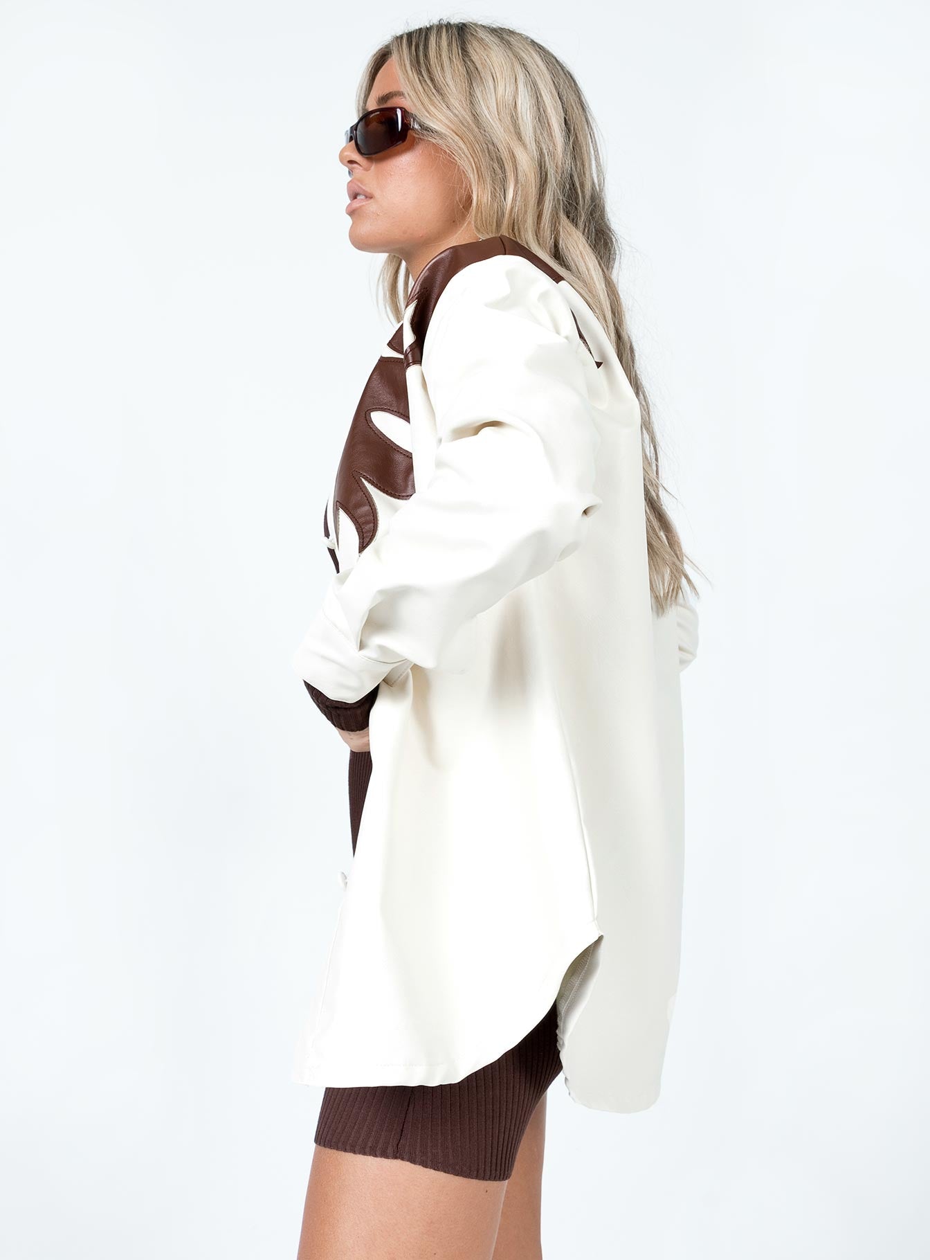 Jacket Faux leather material  Western design  Classic collar  Button front fastening  Rounded hem  Single button cuff 