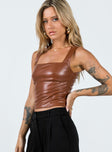 Crop top Faux leather material Square neckline Invisible zip fastening at side Non-stretch