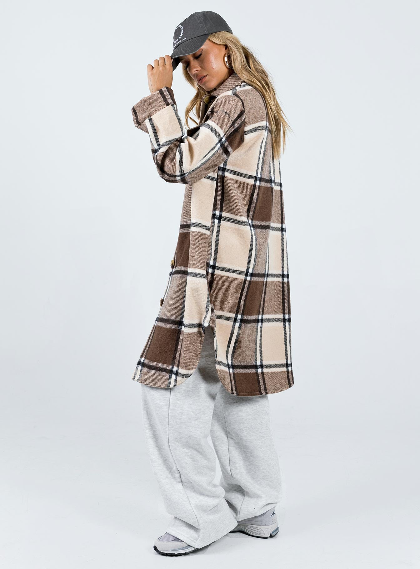 Coat Plaid print Classic collar Button fastening at front Twin chest pockets Single button cuff