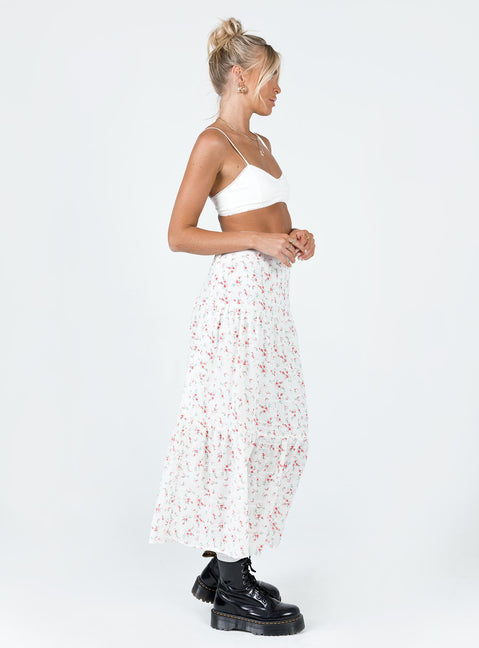   side view of model wearing Princess Polly Athena Maxi Skirt White / Pink Floral Maxi 