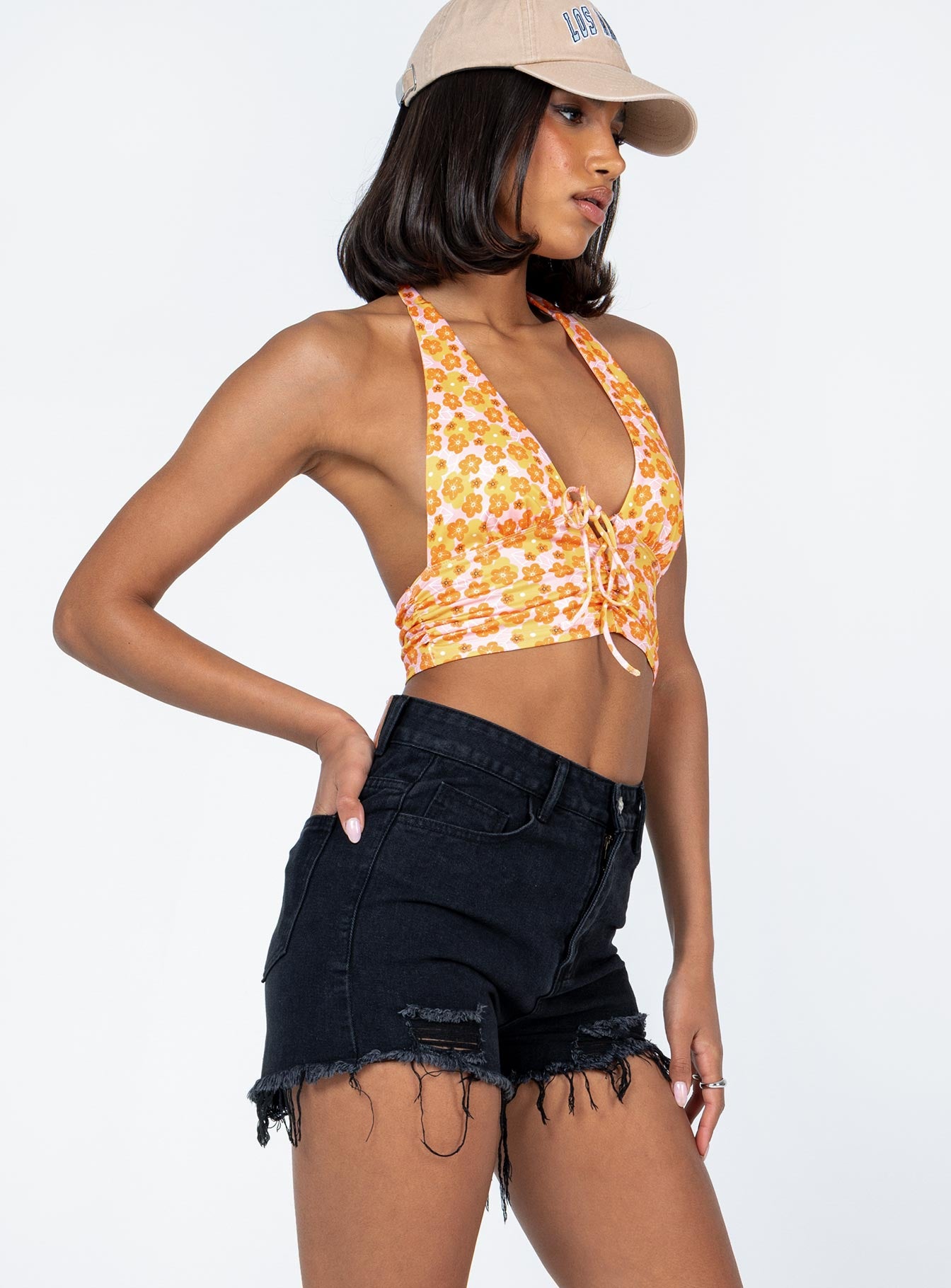 Black denim shorts High waisted  Zip & button fastening  Belt looped waist  Classic five pocket design  Distressed rips  Frayed hem 