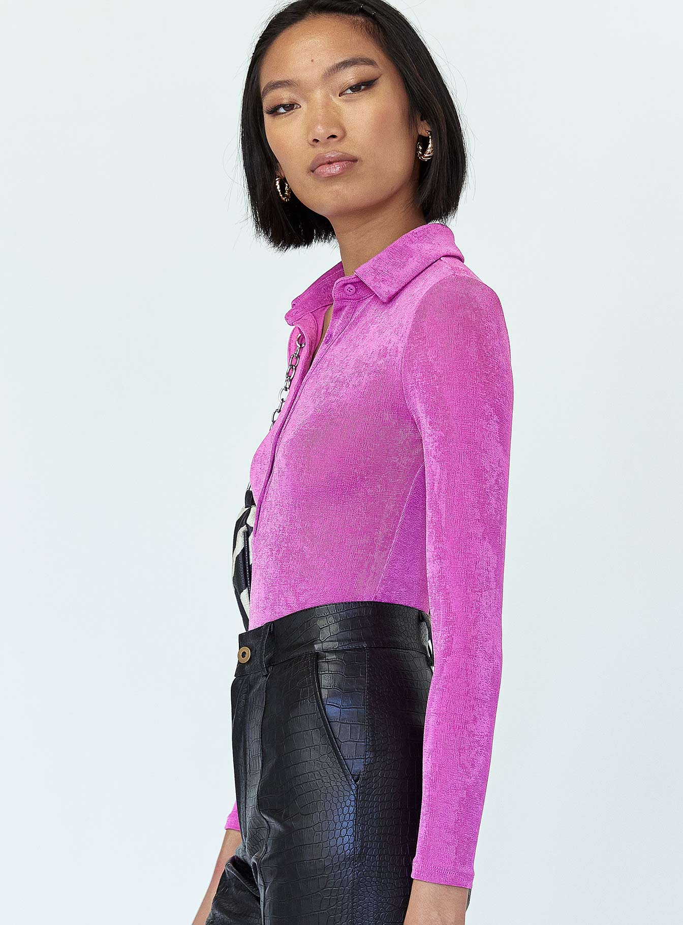 side view of model wearing Princess Polly Elody Long Sleeve Bodysuit Purple Full Sleeves V-Neck 