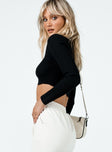 side view of model wearing Princess Polly Loreta Long Sleeve Top Black 