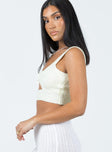 Crop top Soft knit material  Knot bust  Cut out detail 