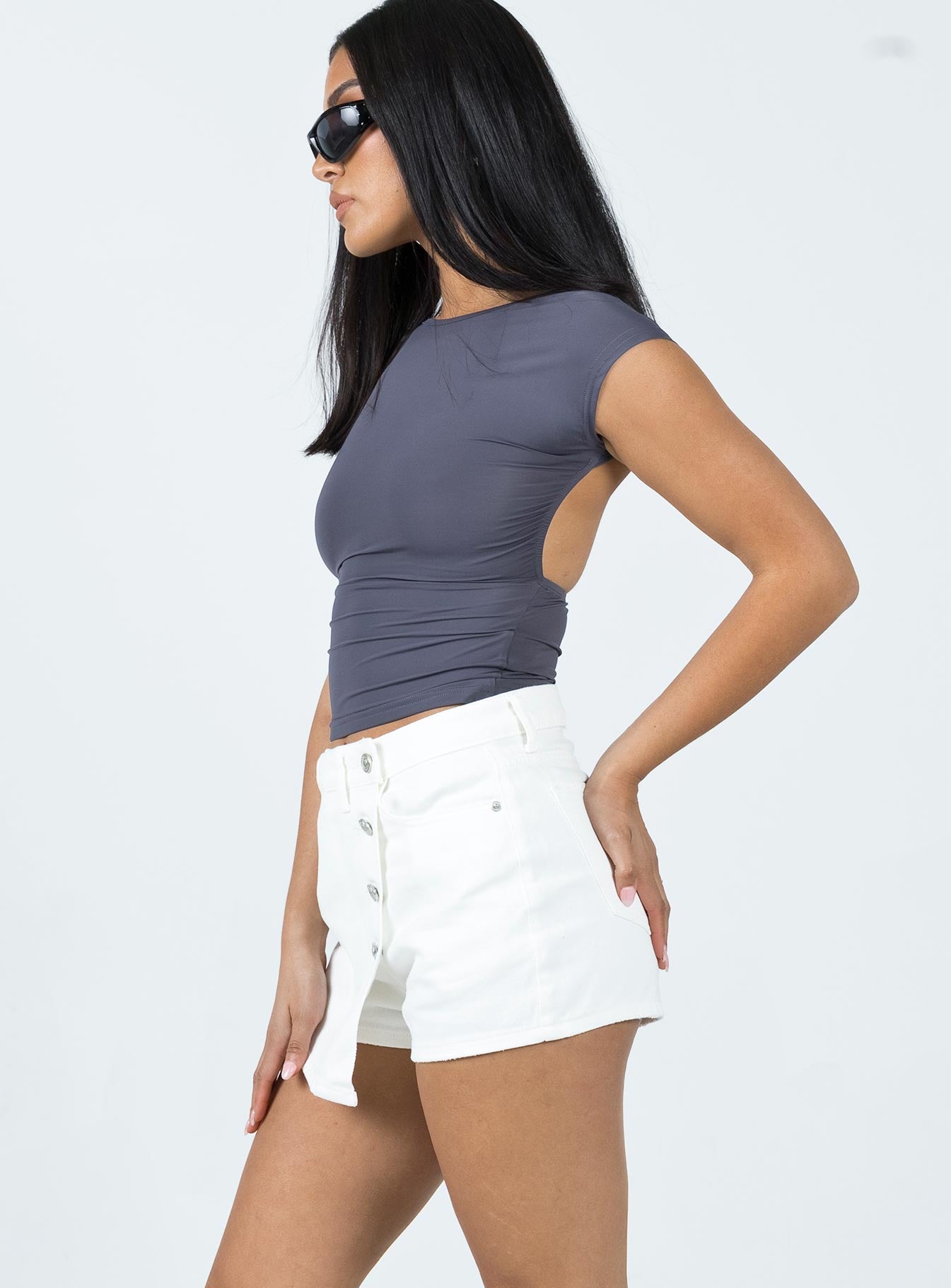 Denim skort Belt loop waist Zip & four button fastening Classic five-pocket design Skort style