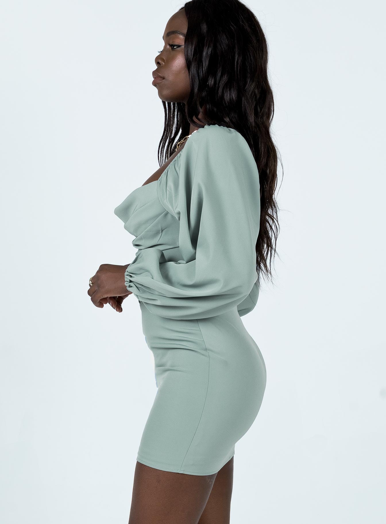 side view of model wearing Princess Polly Lillie Long Sleeve Mini Dress Sage 