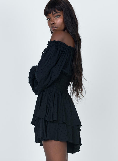 Long sleeve romper Soft textured material Shirred waistband Ruffle detailing Elasticated neck and sleeves Can be worn on or off shoulder Layered ruffle hem