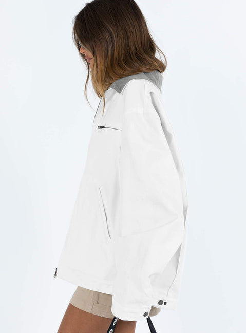 White jacket Classic collar Zip fastening at front Twin hip pockets  Chest pocket Press button fastening at cuff