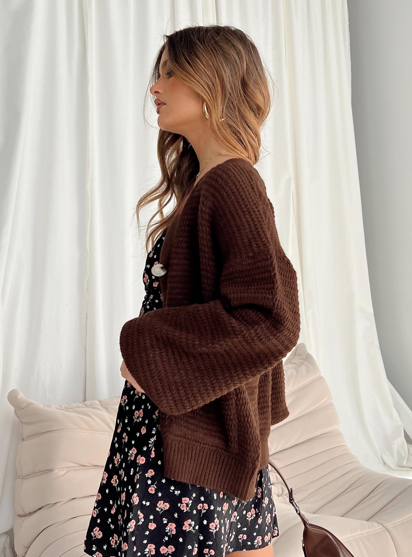side view of model wearing Princess Polly Abel Cardigan Brown Long 