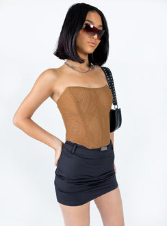   side view of model wearing Princess Polly Buckle Up Mini Skirt Black Mini Skirts 