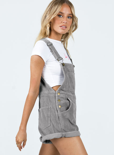 Overalls Corduroy material Adjustable buckle straps Button fastening at sides Large chest pocket Classic four pockets  Gold-toned hardware  Fixed rolled hem
