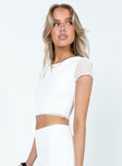 White crop top Sheer mesh material  Diagonal stitching  Good stretch 