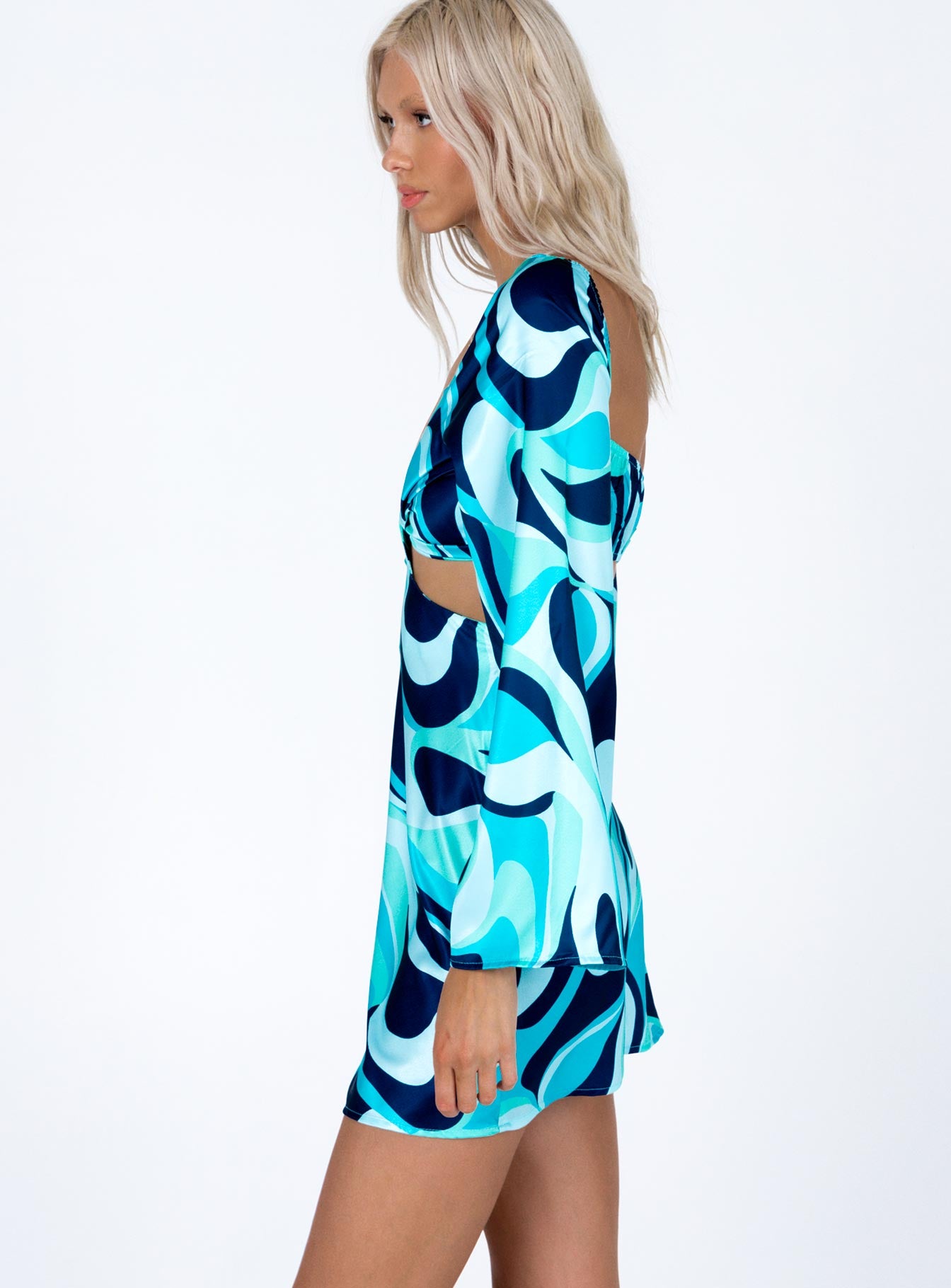 side view of model wearing Princess Polly Dominique Mini Dress Blue Multi 