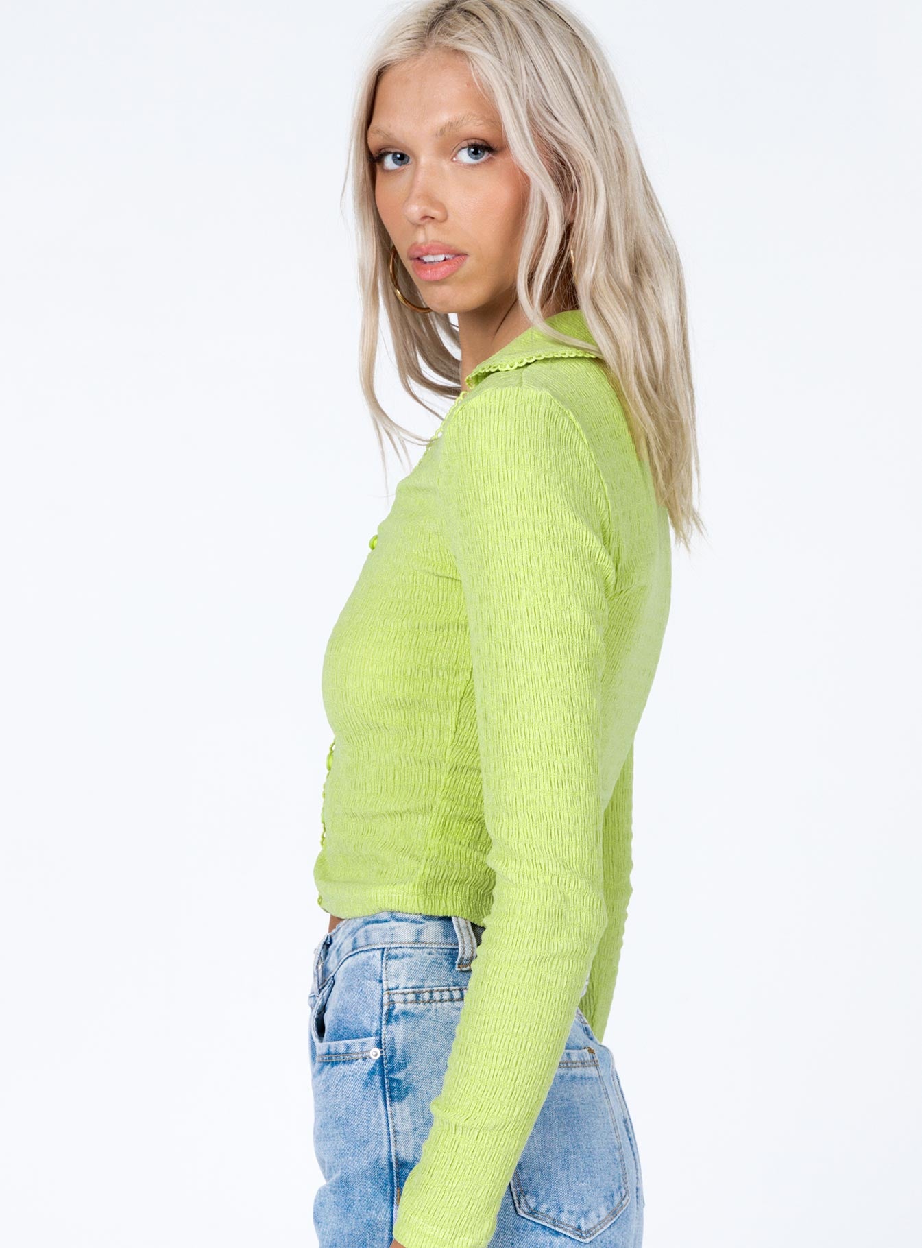 side view of model wearing Princess Polly Emmaline Long Sleeve Top Green 
