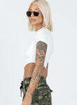 Crop top 95% recycled polyester 5% elastane Ribbed material  Cap sleeves  Rounded hem 