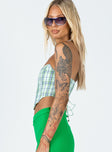 side view of model wearing Princess Polly Maiya Strapless Top Green Check 