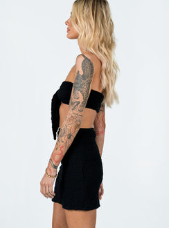 Matching set  Slim fitting  50% nylon 40% rayon 10% elastane  Crinkle material  Crop top  Tie front fastening  Inner silicone strip at bust  High waisted mini skirt  Elasticated waistband Invisible zip fastening at side 