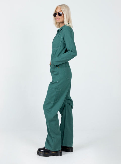 Boiler suit 100% cotton Relaxed fit Contrast stitching  Classic collar  Zip front fastening  Twin chest pockets  Six leg pockets  Elasticated waistband   Wide leg  Pleated detail at inner leg 