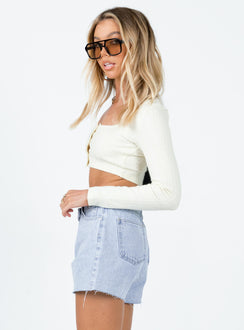 Shorts 100% cotton Asymmetrical zip & button fastening High waisted Light wash blue Belt looped waist Five-pocket design Distressed hem