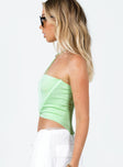 side view of model wearing Princess Polly Javius Top Green Sleeveless Square Neck 