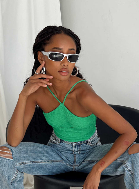 side view of model wearing Princess Polly Niles Bodysuit Green Sleeveless Asymmetric Neckline 