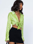 side view of model wearing Princess Polly Talissa Long Sleeve Top Green 