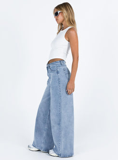 Front view of model wearing  front Princess Polly High Waisted  Naylor Wide Leg Jeans Light Wash Denim