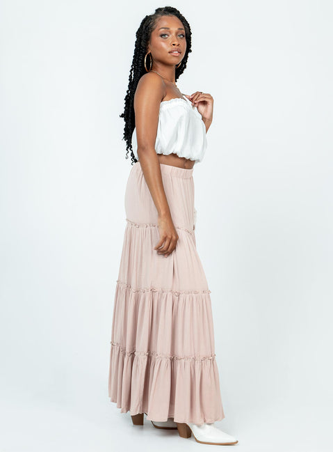   side view of model wearing Princess Polly Miriah Maxi Skirt Beige Maxi 