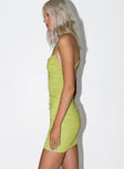 side view of model wearing Princess Polly Dottie Mini Dress Sage 