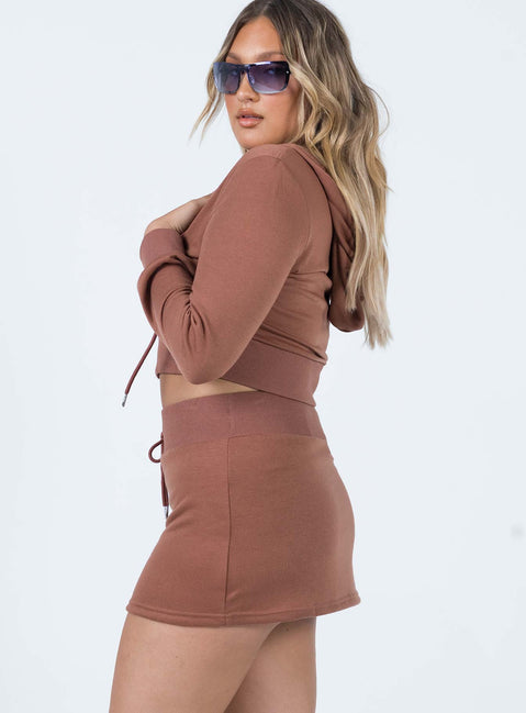   side view of model wearing Princess Polly Jaded Y2k Terry Mini Skirt Brown 