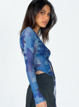 side view of model wearing Princess Polly Suzy Long Sleeve Top Blue 