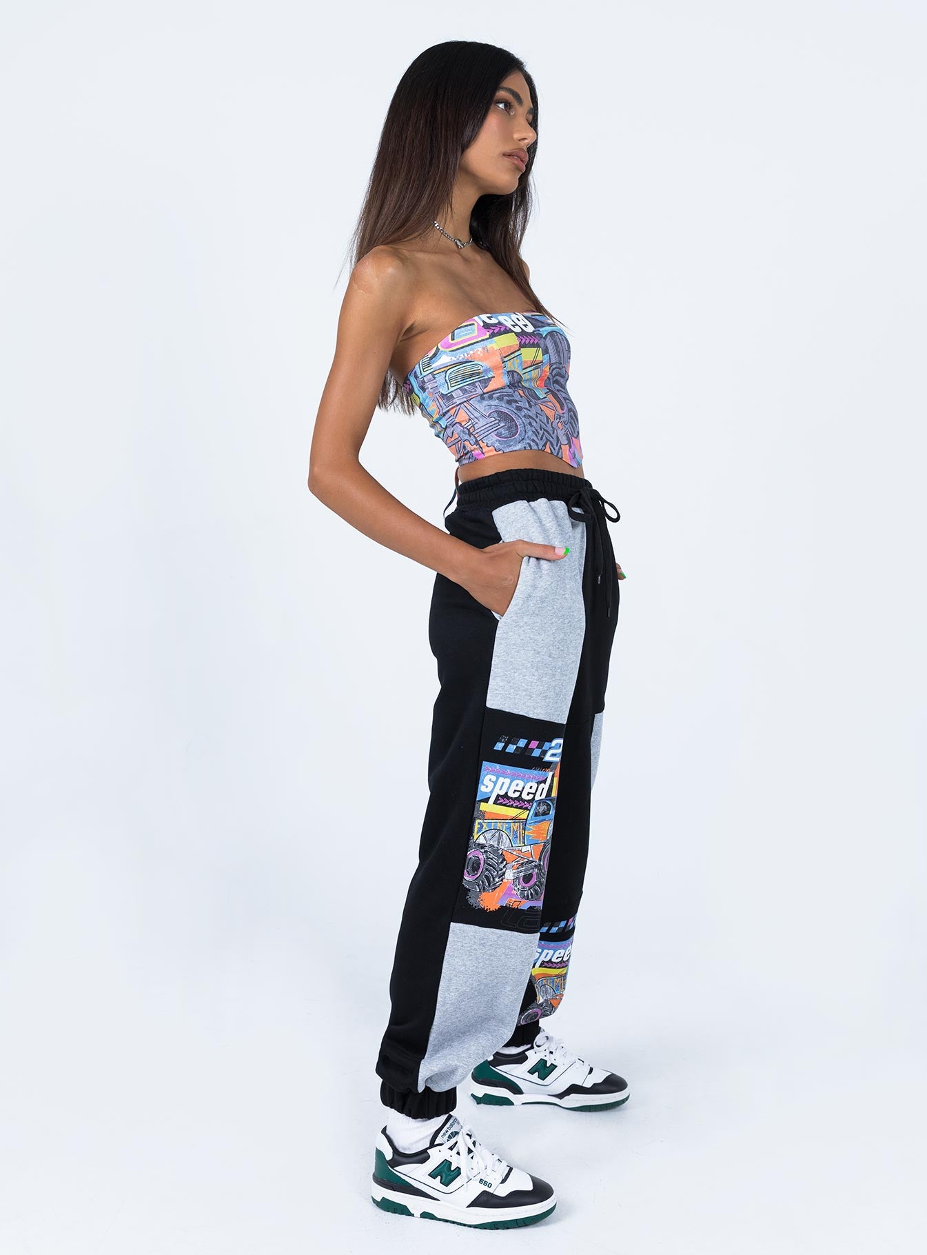 side view of model wearing Princess Polly Speedway Trackpants Multi 