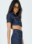 Cropped jacket Dark wash denim Short sleeves Classic collar Buttons fastening at front Twin chest pockets