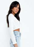 side view of model wearing Princess Polly Ajani Long Sleeve Top White Full Sleeves Scoop Neck 