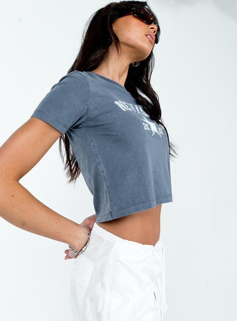 side view of model wearing Princess Polly Nevada Tee Navy Short Sleeves Crew Neck 