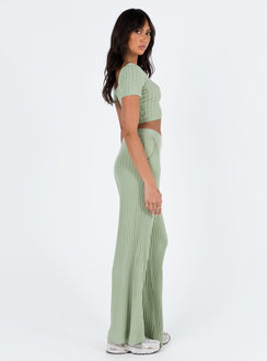 Two piece set Knit ribbed material Crop top Inner silicone strip along shoulders Wide neckline High waisted pants Thick elasticated waistband Twin hip pockets Wide flared leg