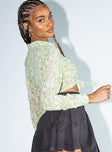 side view of model wearing Princess Polly Nayo Long Sleeve Top Green 