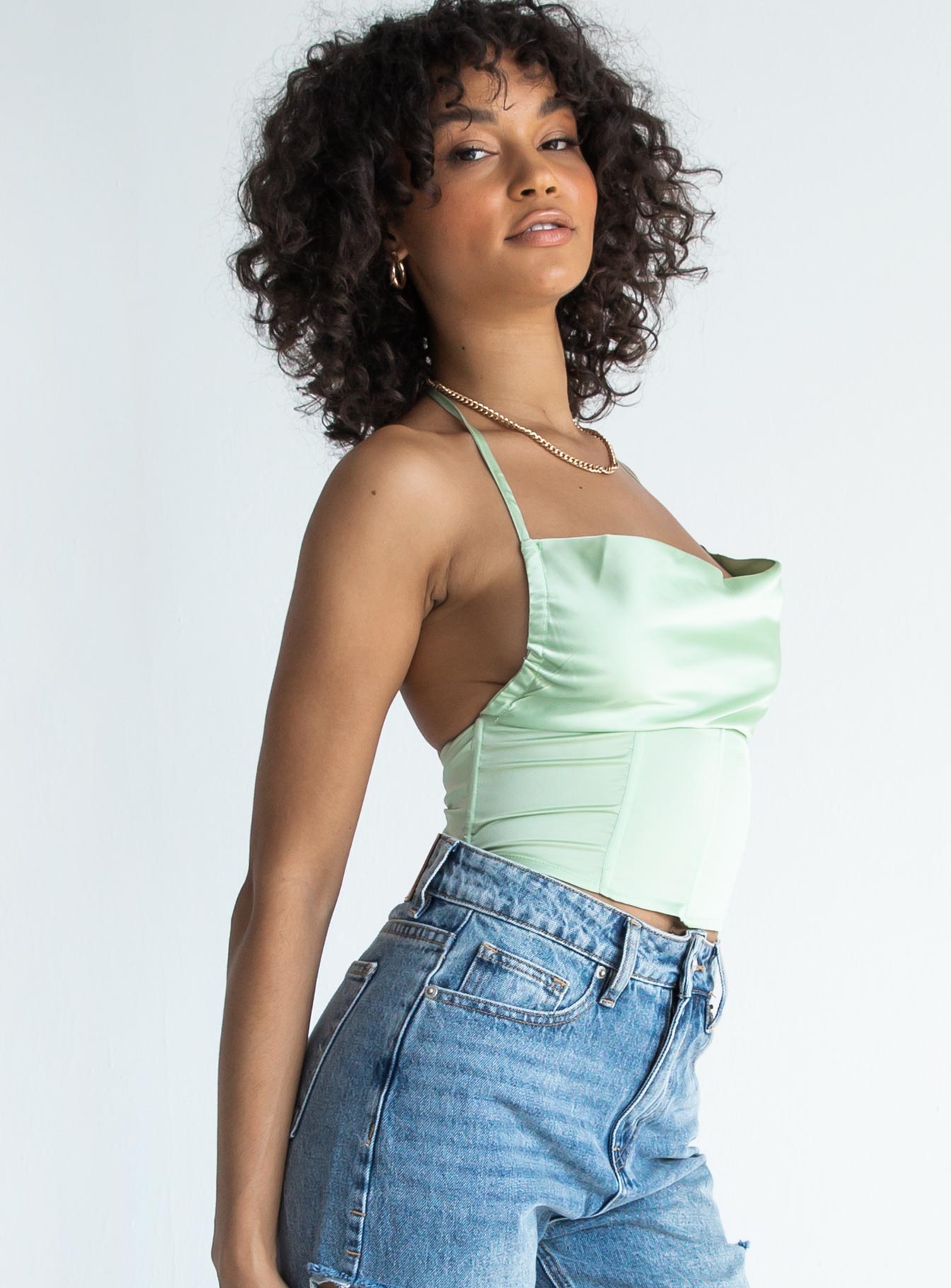 side view of model wearing Princess Polly Michelle Top Green 