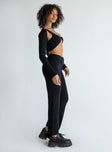 side view of model wearing Princess Polly Alma Pants Black 