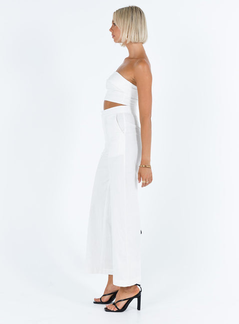 White matching set Linen look material Strapless crop top Folded neckline Inner silicone strip at bust Zip fastening at back High waisted pants Front button and zip fastening  Twin hip pockets