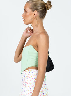 side view of model wearing Princess Polly Carlie Top Green 