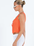 Orange top Sheer knit material Scoop neck Double tie fastening at front Good Stretch Unlined 