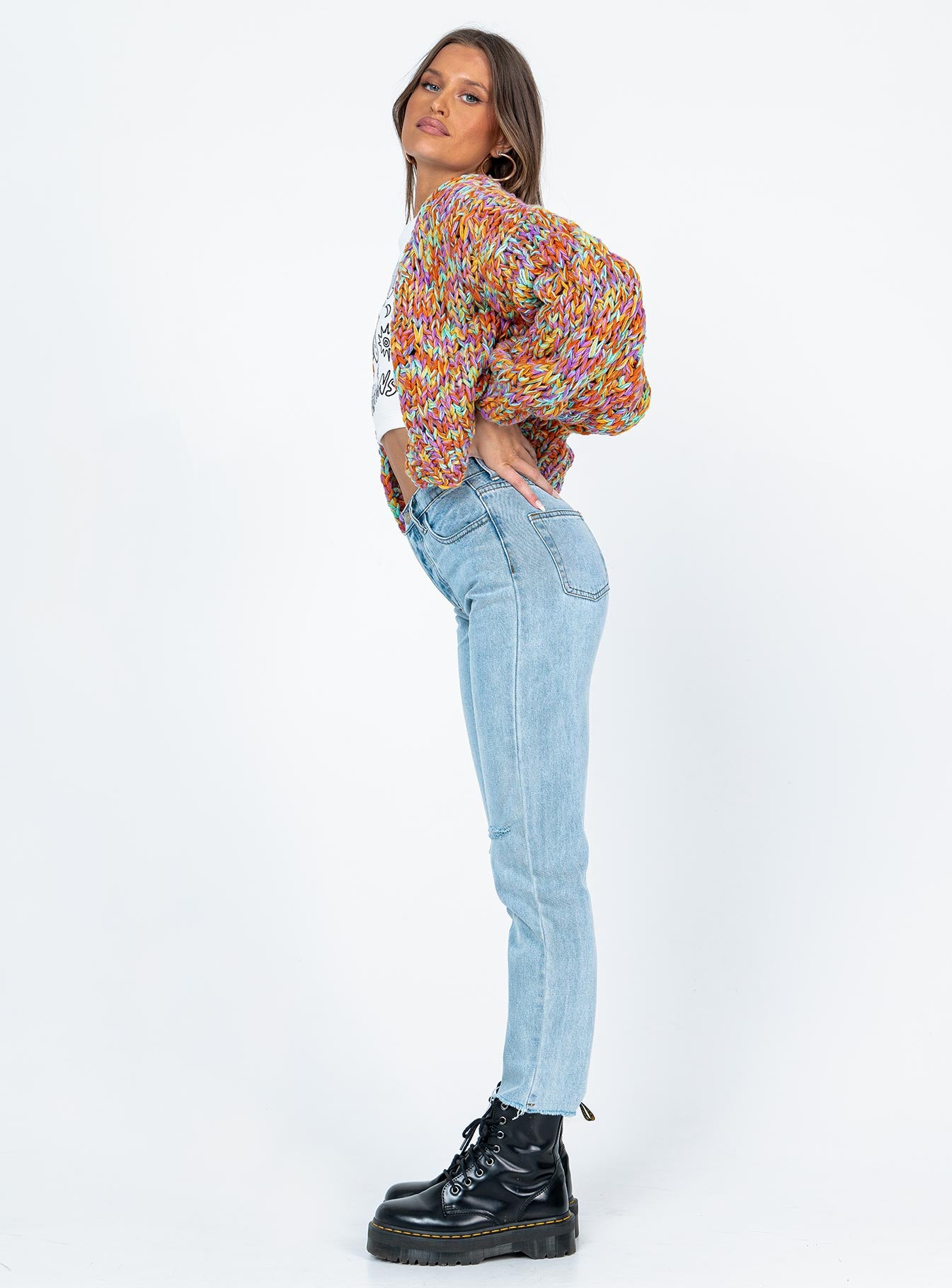 side view of model wearing Princess Polly Attica Knee Rip Denim Jeans Mid Rise 