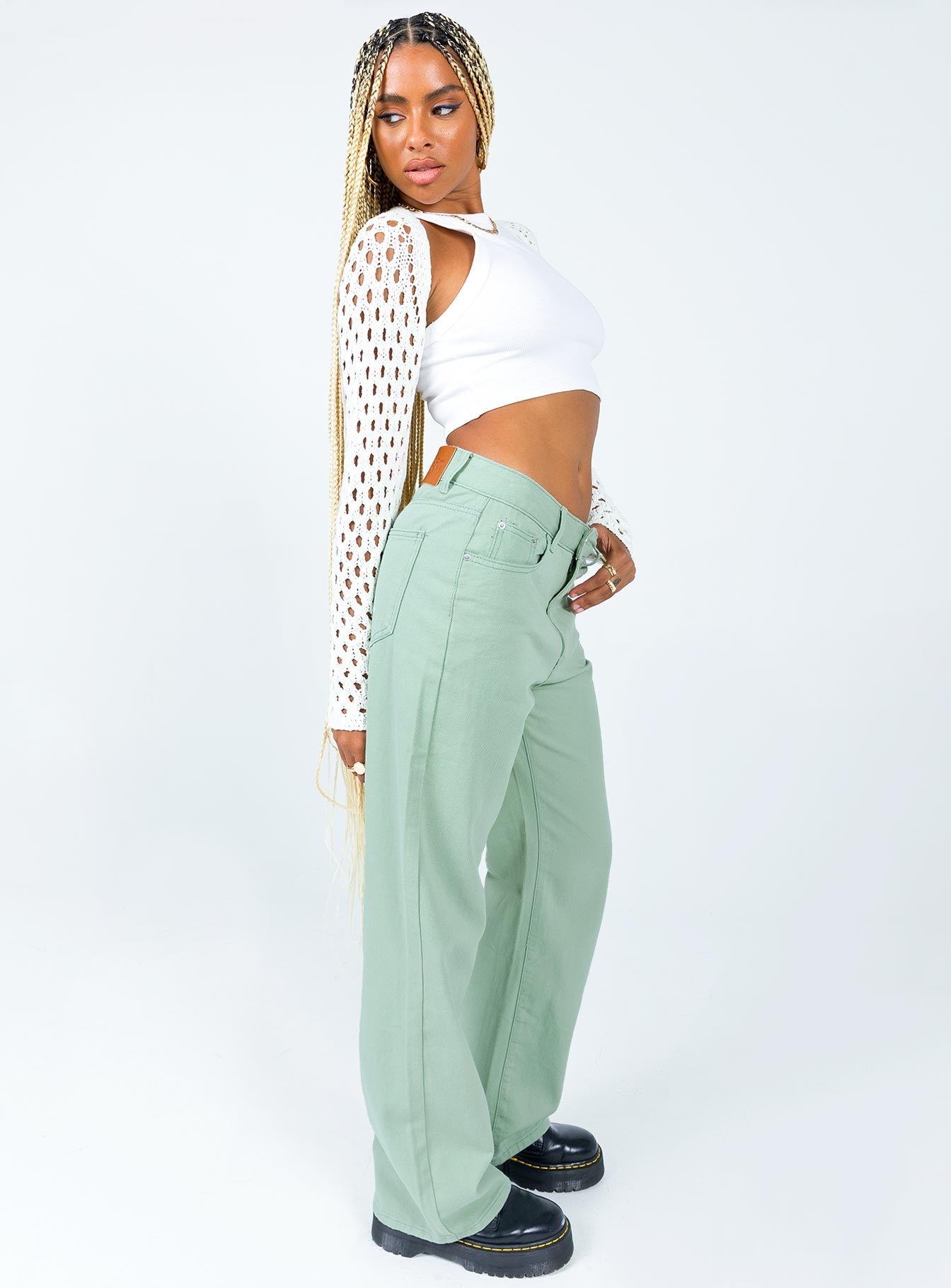 side view of model wearing Princess Polly Lester Mom Jeans Sage Green Mid Rise 