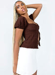 side view of model wearing Princess Polly Patrea Top Brown Short Sleeves Square Neck 