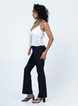 side view of model wearing Princess Polly Yianna Low Waist Flare Pant Black 